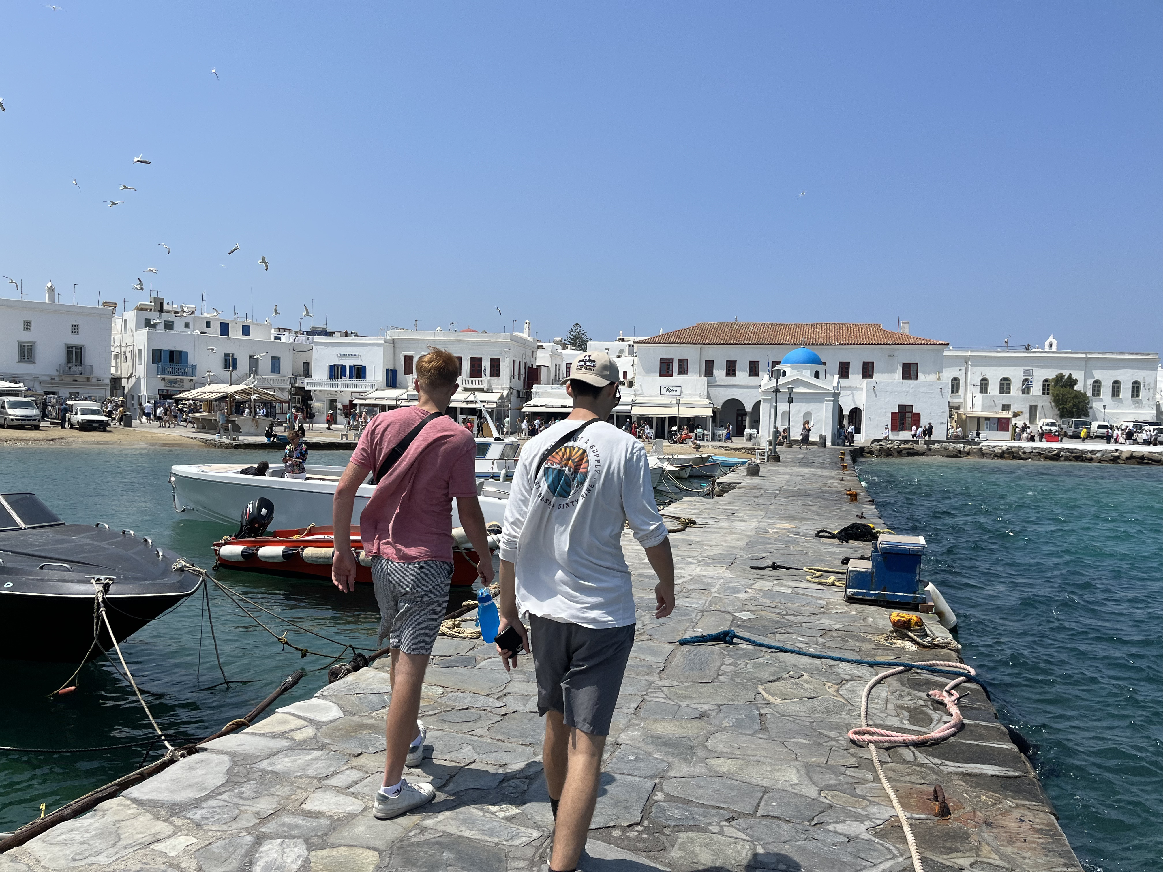 Jacob and Jake at a dock in Mykonos