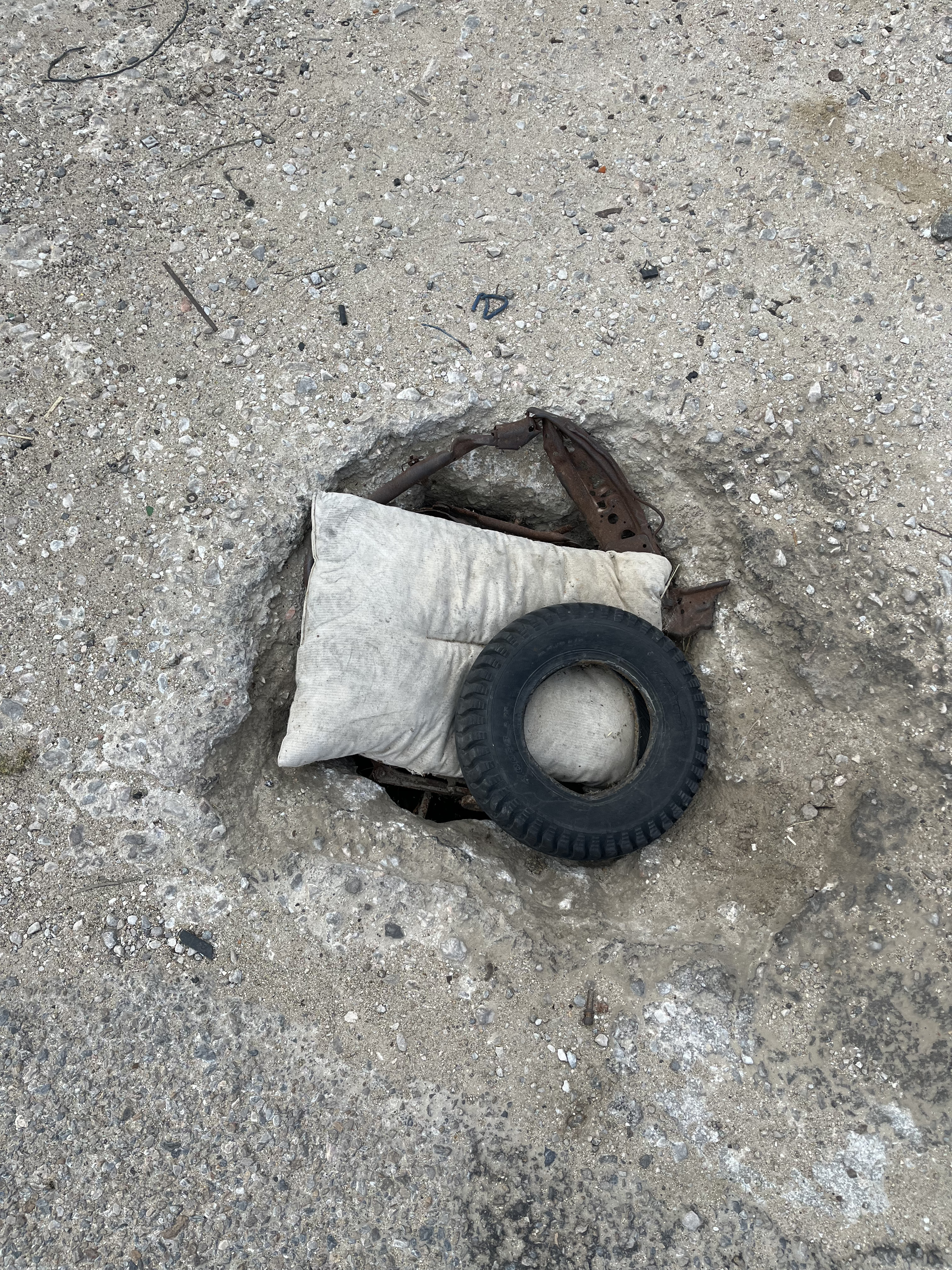 Poorly repaired road in Mykonos